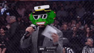 Frog Mask Man Talking Into Bruce Buffer Microphone GIF
