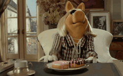 Frustrated Miss Piggy Head Bump GIF