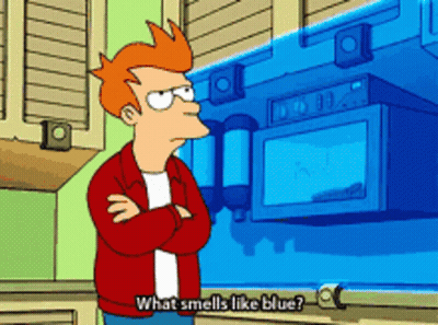 Fry From Futurama Stands In Front Of A Blue Microwave And Says What Smells Like Blue GIF