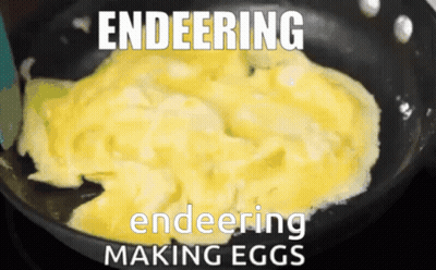 Frying Pan With Scrambled Eggs Saying Endeering Making Eggs GIF