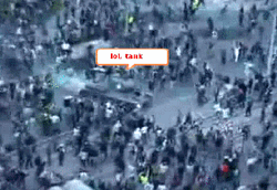 Funny Caption Tank Protest Meme GIF