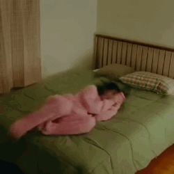 Funny Girl Rolling In Bed