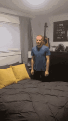 Funny Guy Flop On Bed GIF