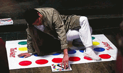 Funny Guy Playing Color Twister Game Alone GIF