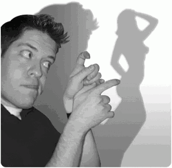 Funny Guy Playing With Shadow GIF