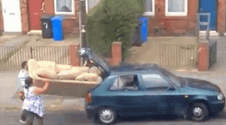 Funny Guys Moving Sofa GIF