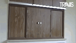 Funny Happy New Year Cupboard Surprise GIF