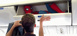 Funny How Spiderman Got Stuck On Plane Luggage Compartment GIF