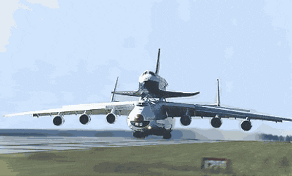 Funny How This Plane Give Piggyback Ride To Smaller Plane GIF