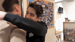 Funny Hug Eyes Blaring Brother Hug GIF