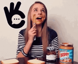Funny Lady Applies Peanut Butter On Her Face GIF