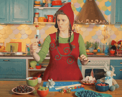 Funny Lady Santa Baking GIF