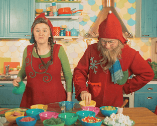 Funny Mister And  Mrs Santa Cooking GIF