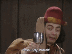 Funny Mr Bean Agree While Holding Wine Glass GIF