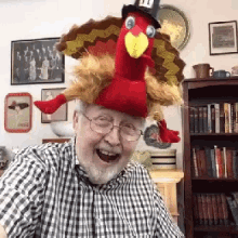 Funny Old Man Using Turkey Toy GIF