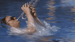 Funny Playing Bugle In Water GIF