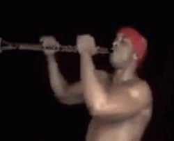 Funny Ricardo Playing Flute GIF