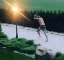 Funny Sprinting Man With Machine Gun In Undies GIF