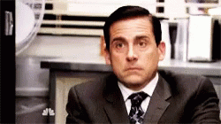 Funny Steve Carell Face Pretending To Work GIF
