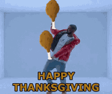 Funny Thanksgiving Man Holding Big Drumsticks GIF