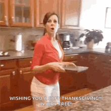 Funny Thanksgiving Woman Stumbling In The Kitchen GIF