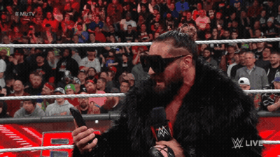 Fur Coat Announcer At Wrestling Show GIF