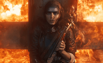 Furiosa Hiding Behind Big Fence GIF