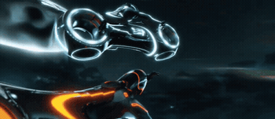 Futuristic Motorcycle Flying Through Dark Sky GIF