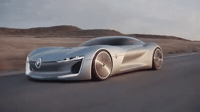 Futuristic Silver Sports Car Driving Down Road GIF