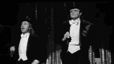 Galician Freaky Film Festival Two Men In Tuxedos GIF