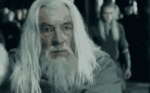 Gandalf Throwing Off His Clothes GIF