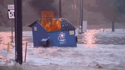 Garbage Flood On Fire GIF