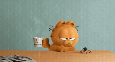 Garfield Throws Paper At Black Spider GIF