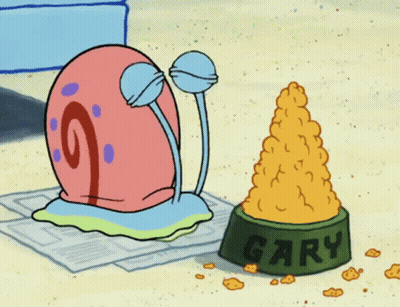 Gary Sitting On Newspaper Next To Bowl Of Food GIF