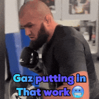 Gaz Putting In That Work Written On Man's Arm GIF