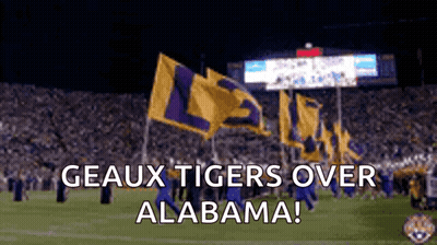 Geaux Tigers Over Alabama Written On A Football Field GIF