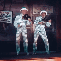 Gene Kelly Donald O'Connor Dancing Singing In The Rain GIF