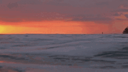 Gentle Ocean Waves At Sunset GIF