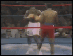George Foreman Down Goes Frazier GIF