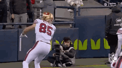 George Kittle Throwing The Ball GIF
