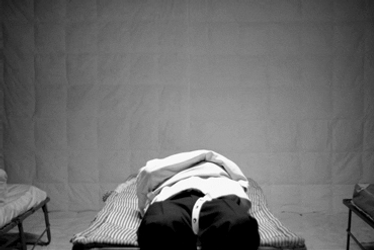 Getting Up Removing Straight Jacket GIF