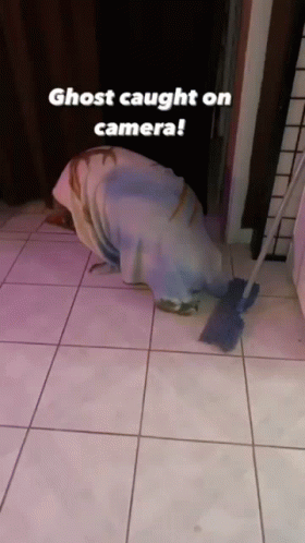 Ghost Crawling With Mop On Tiled Floor GIF