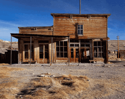 Ghost Town With Tumbleweeds Passing By GIF