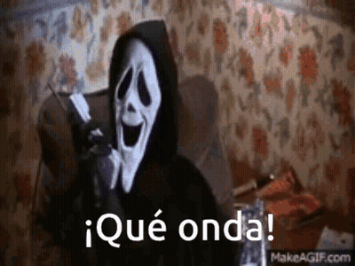 Ghostface Talking On Cell Phone In Chair GIF