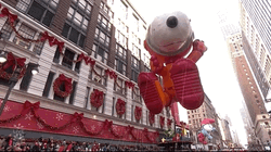 Giant Balloon Snoopy Floating GIF