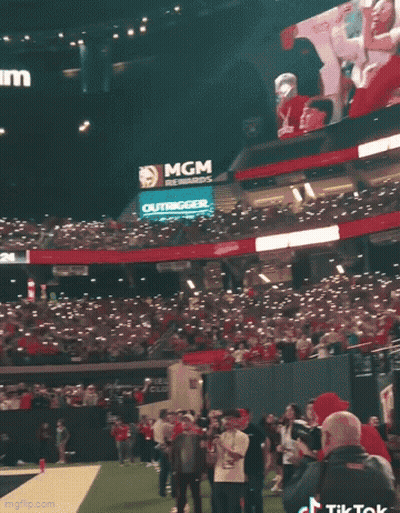 Giant Stadium With MGM Rewards And Outtrigger Signs GIF
