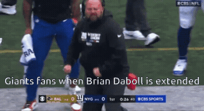 Giants Fan Kneeling When Brian Daboll Is Extended GIF