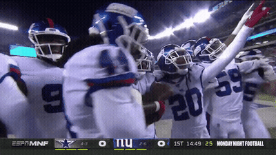 Giants Football Players Huddled Together GIF