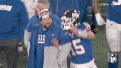 Giants Player Helped Off Field By Man In Giants Hat GIF