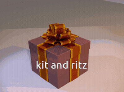 Gift Box With Bow Saying Kit And Ritz GIF